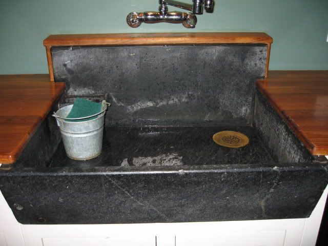 salvaged soapstone sink/teak counter